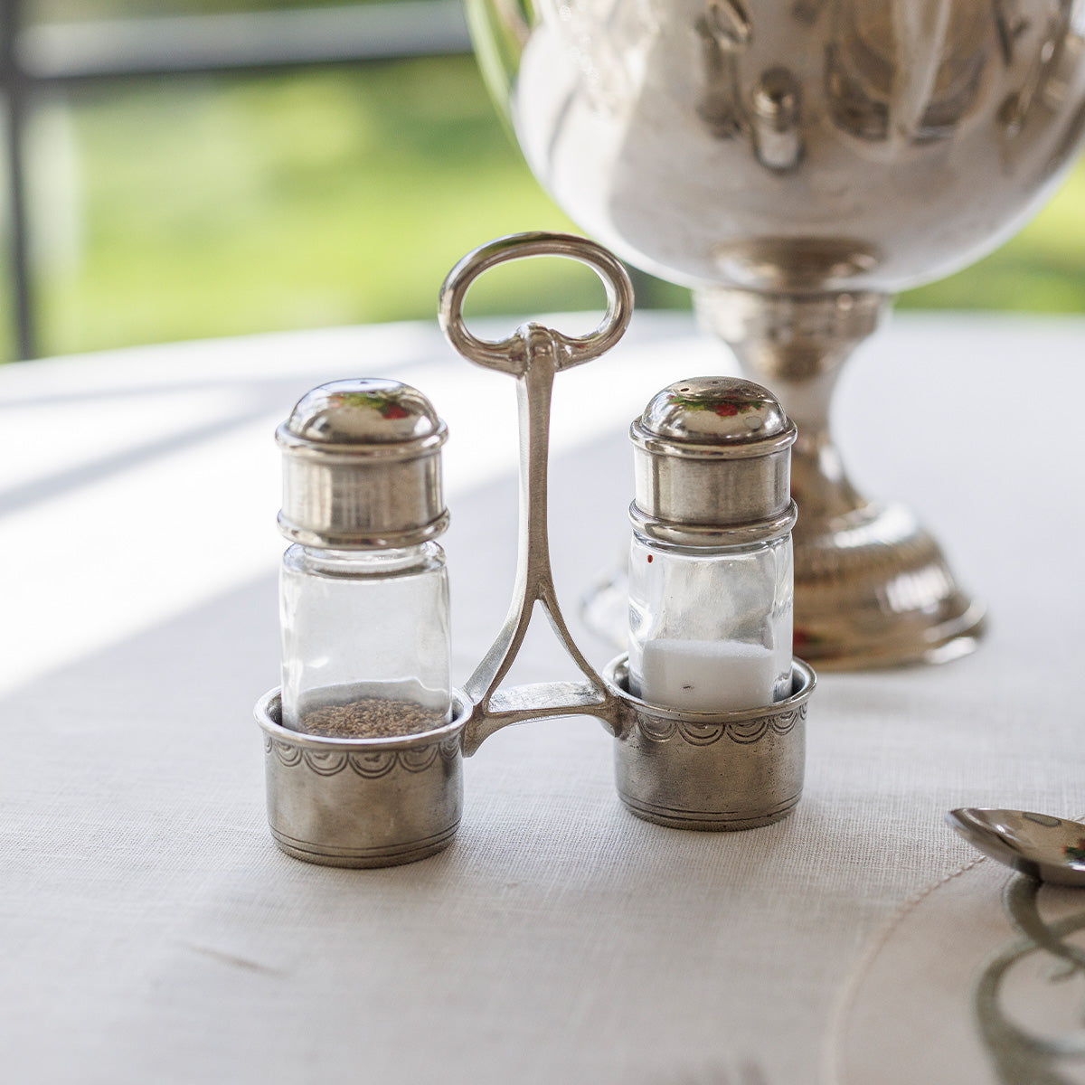 Tall salt and pepper shop shakers